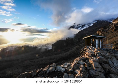 Tourist Toilets At Summit Base Camp Of Mount Kilimanjaro At Sunset, Africa