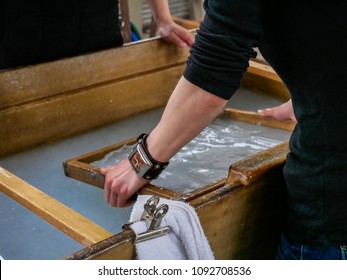 Tourist Trying Traditional Japanese Washi Paper Making