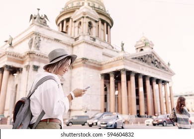 Tourist using navigation app on the mobile phone. Travel concept. Adventure