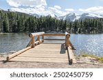 Tourist Viewing platform at Sprague Lake in Rocky Mountain National Park, Colorado, USA