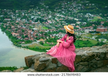 Tourist visiting at Jvari Monastery and Mtskheta city in Georgia.