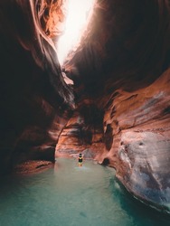 Tourist In Wadi Mujib Gorge In Jordan Which Enters The Dead Sea At 410 Meters Below Sea Level. The Mujib Reserve Of Wadi Mujib Is The Lowest Nature Reserve In The World