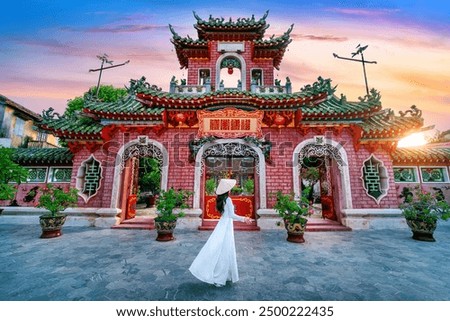 Tourist walking at Fukian Assembly Hall in the Hoi An ancient town, Vietnam.