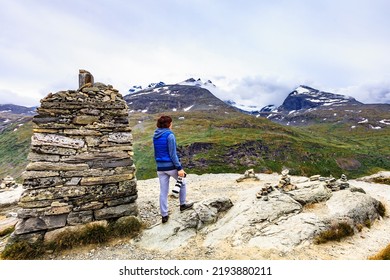 Tourist Woman Enjoy Mountains Landscape, Taking Travel Photo With Camera. National Tourist Scenic Route 55 Sognefjellet, Norway