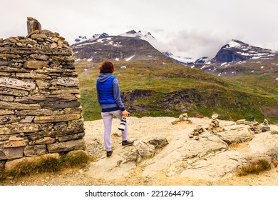 Tourist Woman Enjoy Mountains Landscape, Taking Travel Photo With Camera. National Tourist Scenic Route 55 Sognefjellet, Norway