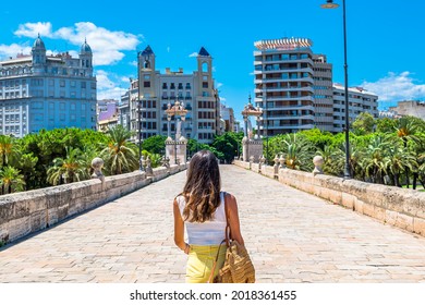 Tourist woman enjoying the city of Valencia (Spain).