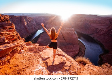 Tourist Woman On Horseshoe Bend In Grand Canyon