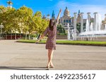 Tourist woman on Montjuic hill. Populal sight in Barcelona, Spain.