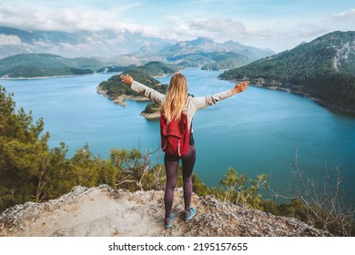 Tourist woman raised hands enjoying lake view outdoor Travel in Turkey adventure trip active vacations healthy lifestyle eco tourism girl hiking solo - Shutterstock ID 2195157655