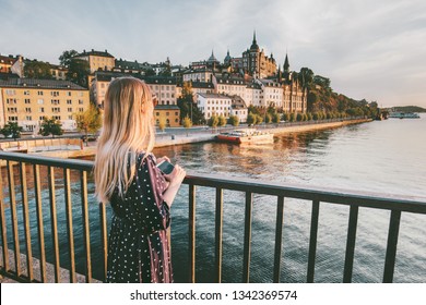 Tourist Woman Sightseeing Stockholm City Enjoying View Traveling Lifestyle Summer Vacations In Sweden  