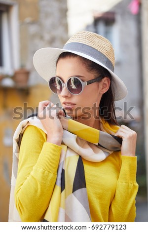 Tourist woman in a small Italian town. Vacation concept