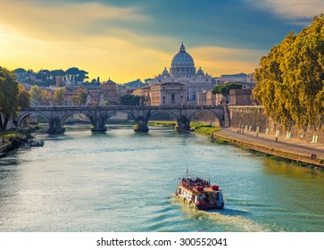 Touristic boat sailing on Tiber river at evening, with Saint Peters basilica on the background. Roma. Italy. - Powered by Shutterstock