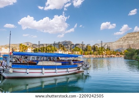 Touristic river boats with tourists in Dalyan resort, Turkey