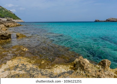Touristic, Rocks by the Mediterranean sea on the island of Ibiza in Spain, holiday and summer scene