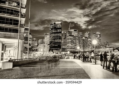 Tourists Along Circular Quay In Sydney At Night.