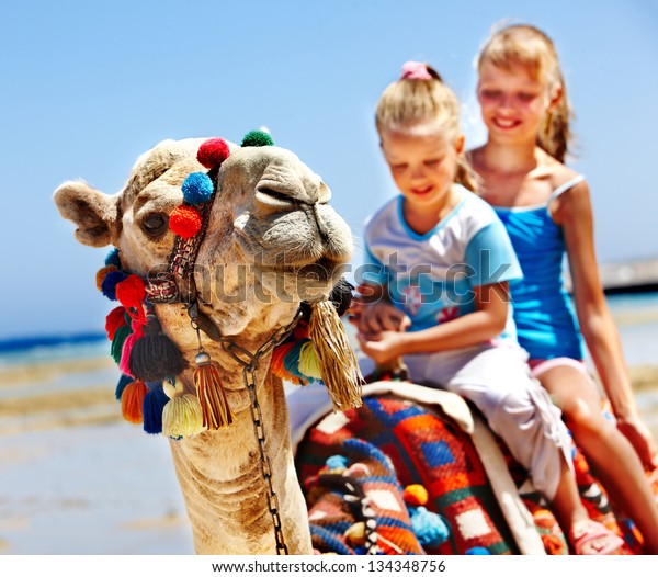 Tourists Children Riding Camel On Beach Stock Photo Edit Now 134348756