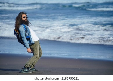 Tourists Enjoy Beach Views In A Quirky Style