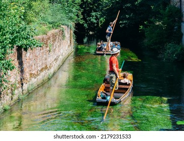 Tourists Enjoy A Punt Ride On The River Stour In Canterbury, UK