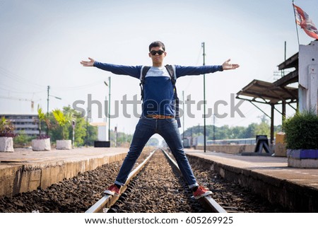 Similar – man traveling in train carriage