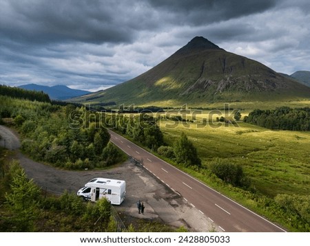 Tourists in a motorhome on the A82 road as it passes Bridge of Orchy in the Scottish highlands. Stock photo © 