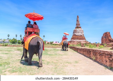 Tourists On An Elephant Ride Tour Of The Ancient City Ayutthaya Asia Thailand