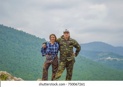 Tourists on top of the mountain - Shutterstock ID 750067261