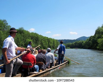Tourists raft on the Dunajec river. Pieniny National Park. State border Slovakia and Poland.