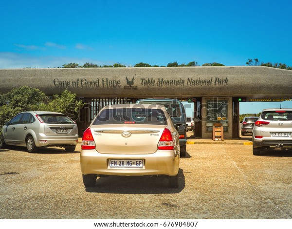 Tourists \'s cars for\
entrance in Cape of Good Hope in Table Mountain National Park with\
blue sky background, Cape Point, Cape Town, South Africa at 15 Nov\
2016.