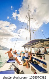 Tourists Sailing Around Madeira Island On A Catamaran Looking For Dolphins And Whales, A Popular Tourist Attraction, On October 11, 2015