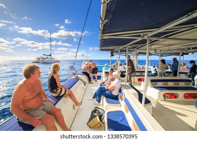 Tourists Sailing Around Madeira Island On A Catamaran Looking For Dolphins And Whales, A Popular Tourist Attraction, On October 11, 2015