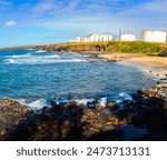 Tourists Searching For Small Pieces of Sea Glass on Glass Beach, Port Allen, Kauai, Hawaii, USA