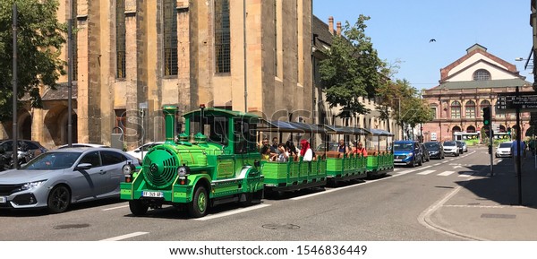 Tourists sightseeing classic
train car at Colmar, France. Taken 20 June 2019 during summer
holidays.