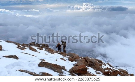 Similar – Über den Wolken Wolkenberg