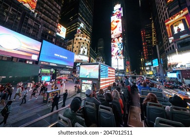 Tourists, Times Square At Night, View From The Tour Bus To The Theater District, Manhattan, Broadway Ad Signs,  W 43th St, New York, NY 10036. 9.02.2021