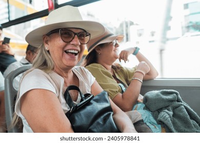 Tourists travel happily on the bus on vacation.