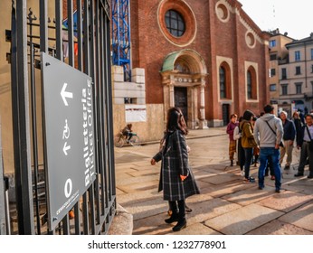 Tourists Visit Santa Maria delle Grazie old Church to see the Last Supper Leonardo Da Vinci famous wall painting in Milan,Italy-November 2018