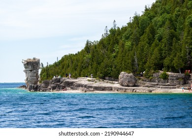 Tourists Visiting Flowerpot Island In Summer