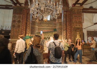 Tourists Visiting The Tomb Of Rumi In Konya. Religious Tourism In Turkey. Konya Turkey - 5.18.2022