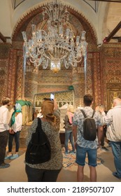 Tourists Visiting The Tomb Of Rumi In Konya. Religious Tourism In Turkey. Selective Focus. Konya Turkey - 5.18.2022