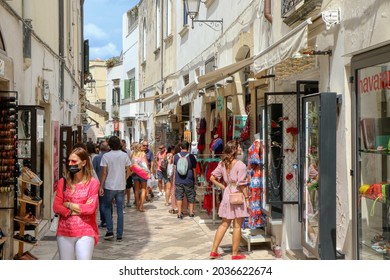 Tourists walk the streets of the historic center of Otranto, Salento, Puglia, Italy - 05.09.2021