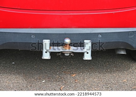 Tow bar on the back of a car with sway bar attachments