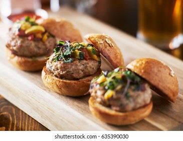 Tow Of Three Mini Turkey Burger Sliders With Brioche Buns