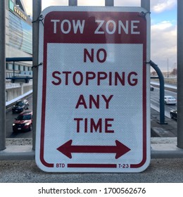 Tow zone sign - no stopping any time
