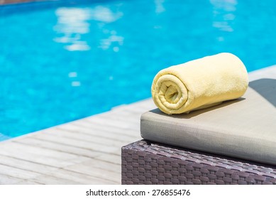 Towel bed pool - Shutterstock ID 276855476