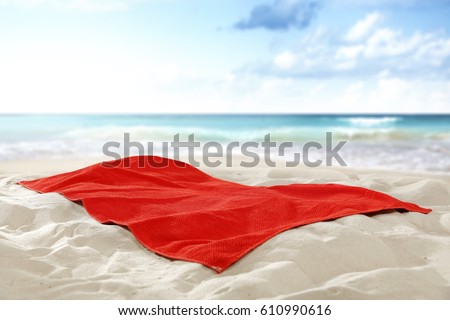 Towel on hot sand of free space for your decoration and landscape of sea 