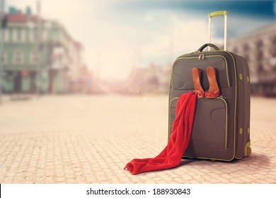 towel of red and big bag in the city  - Powered by Shutterstock