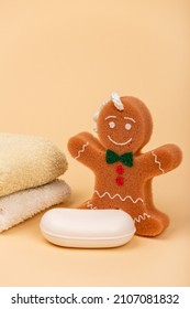 Towel Soap And Washcloth In The Form Of A Cheerful Cookie For Comfortable Washing Of The Child. Child Care And Child Hygiene.