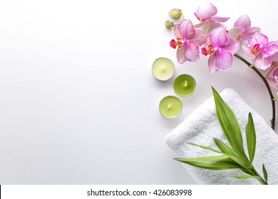 Towel,orchid flowers,bamboo leaf and candle