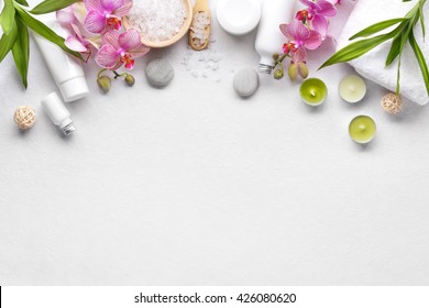 Towel,orchid flowers,bamboo leaf and cosmetics - Powered by Shutterstock