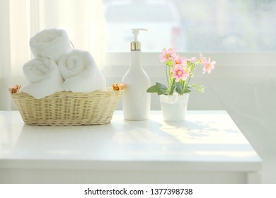 Towels On Basket,  With Copy Space Blurred Bathroom Background. For Product Display Montage.Spa Set